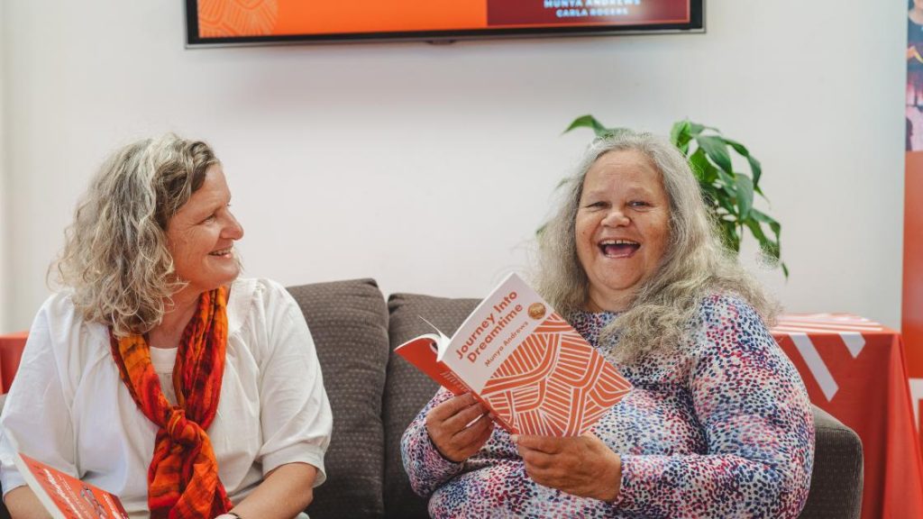 Carla Rogers and Aunty Munya with their books, Practical Reconciliation and Journey Into Dreamtime.